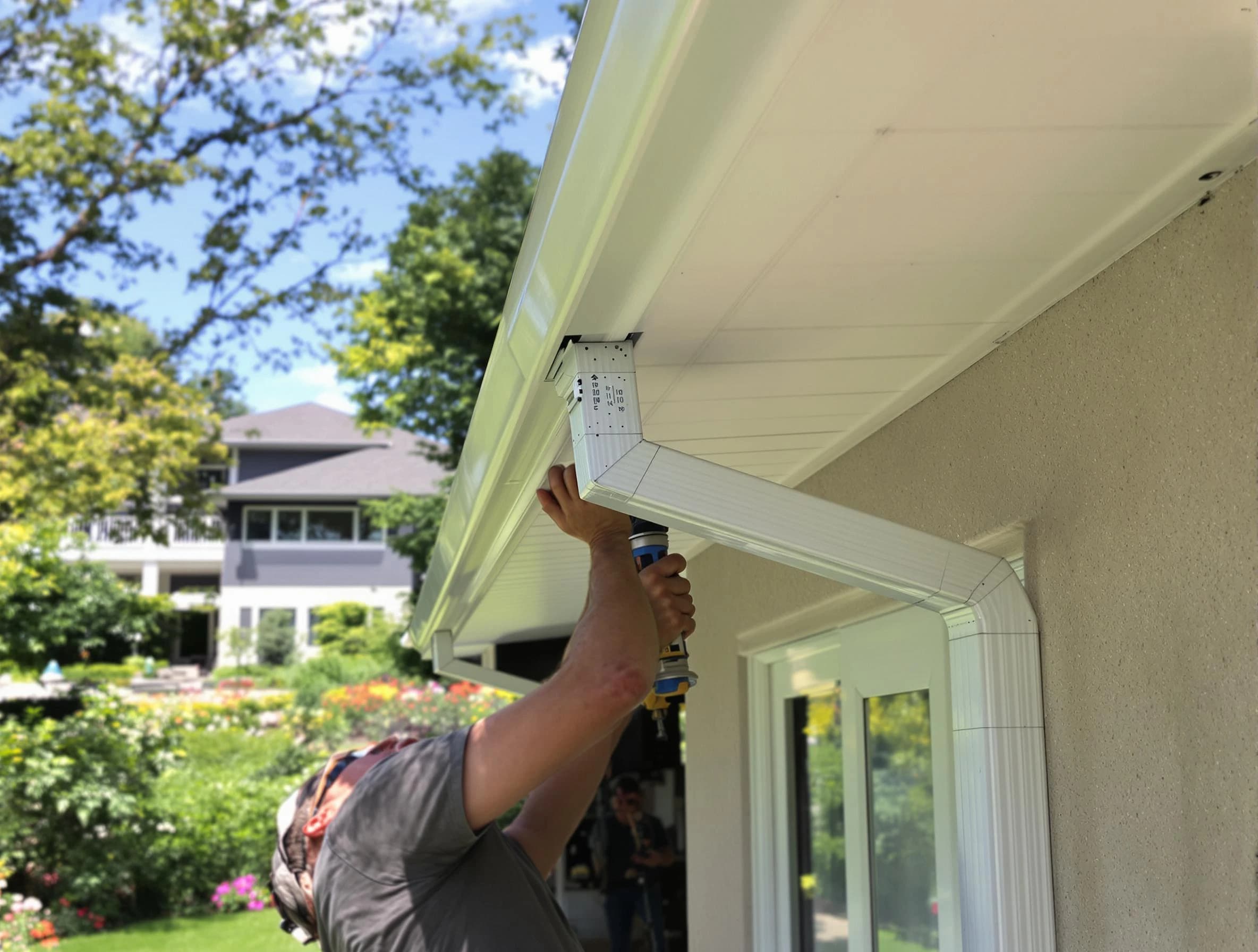 East Cleveland Roofing Company technicians performing gutter installation in East Cleveland, OH